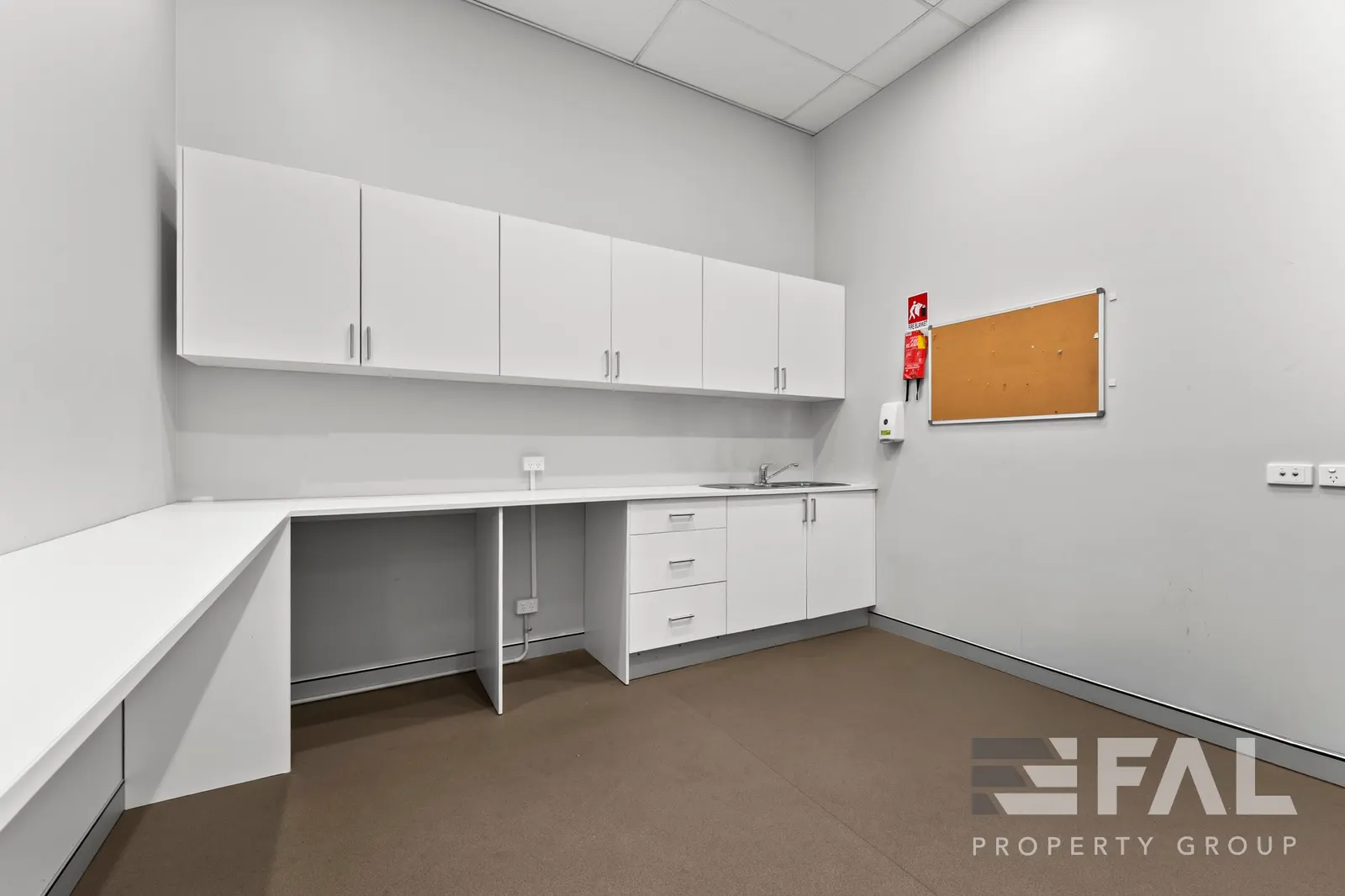 Staff kitchenette and workbench within the tenancy