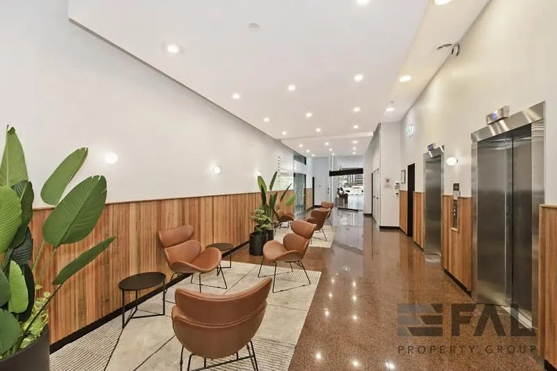 Common lift lobby at 113 Wickham Terrace viewed towards the building entry